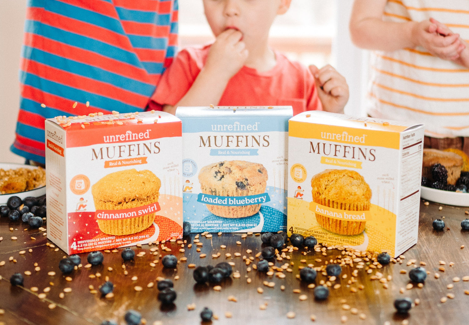 muffin boxes with kids behind